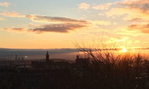 university at sunset, value what you know