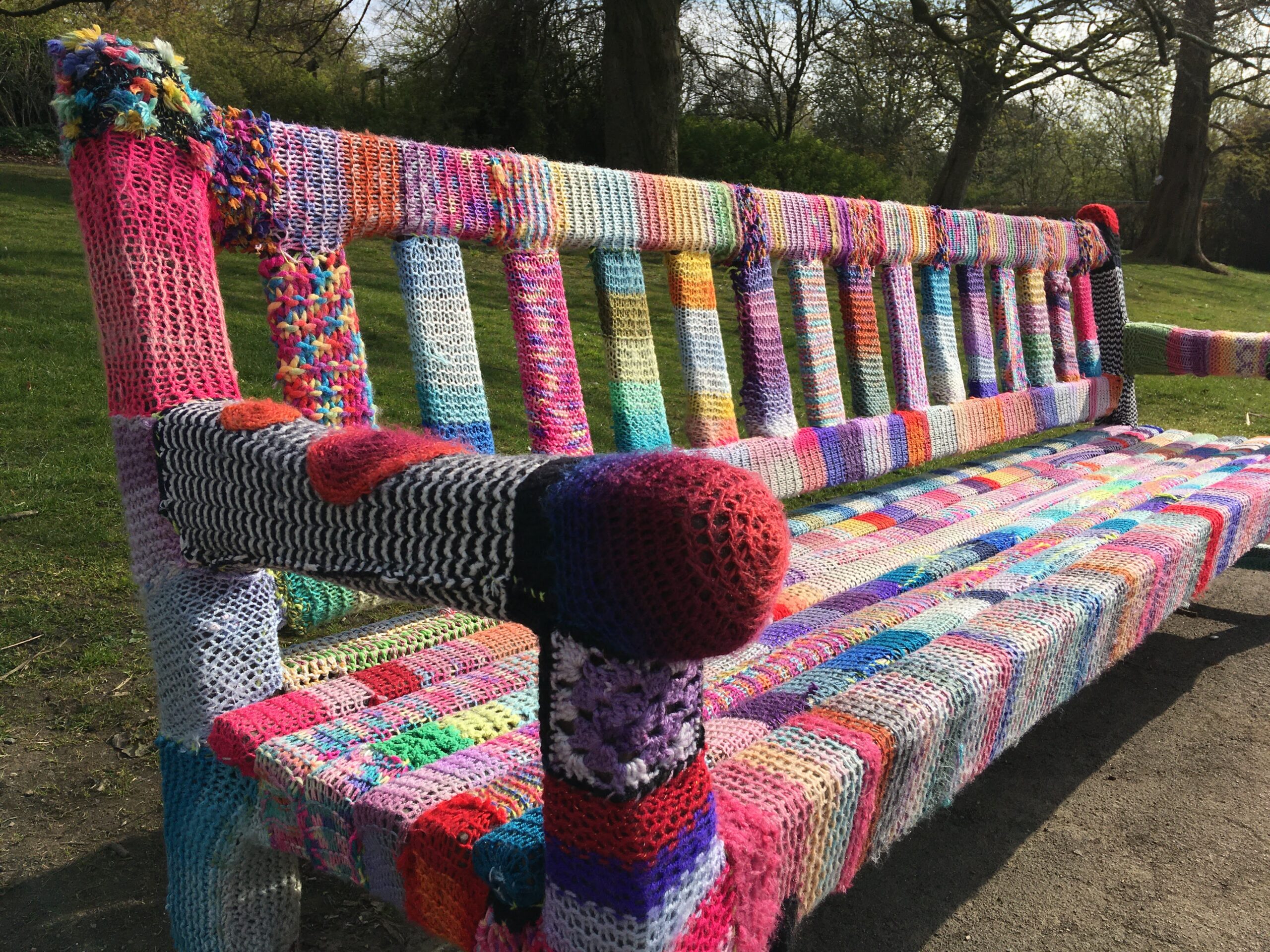 Looking for what is good - knitted cover on a bench